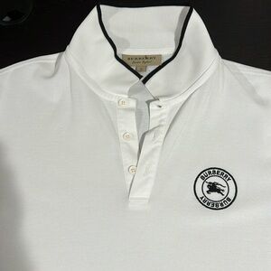 Clean, crisp and like new Burberry Logo polo. Unique and very elegant design